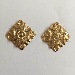 Gold tone pierced pressed metal earrings